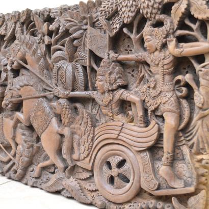 carved wooden panel depicting scene of the Mahabharata